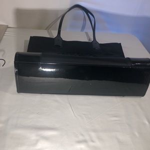 Nice and elegant bag, has zipper packed inside, never used waterproof good for e